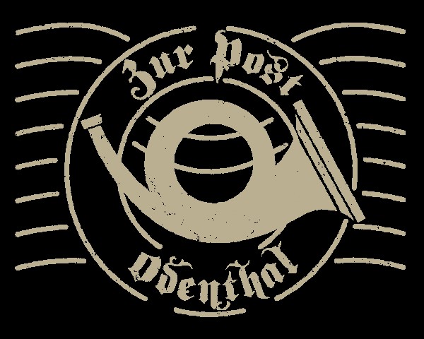 Beige circular emblem on a black background featuring a stylized hand grasping a ball, with curved text around the circle.